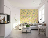 Pale yellow wallpaper featuring classic bird and flower patterns.

