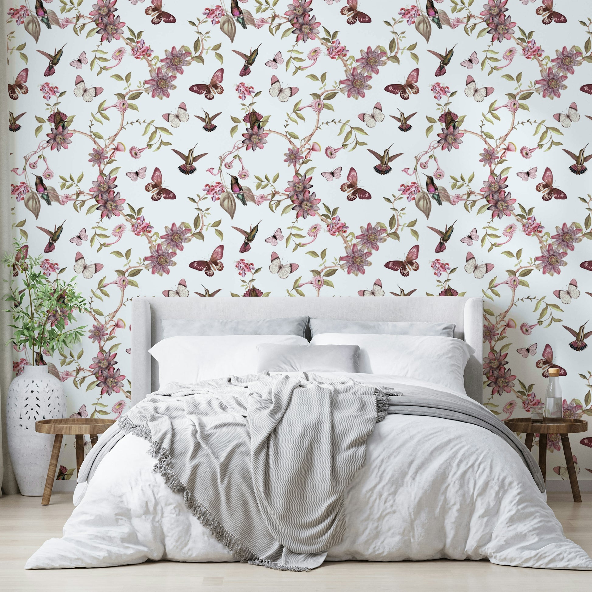 Moody floral mural with lush botanicals and vibrant wildlife.

