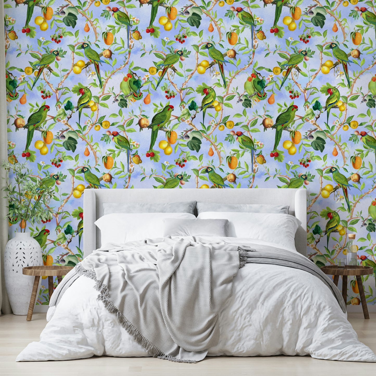 Tropical mural with birds perched on leafy branches.

