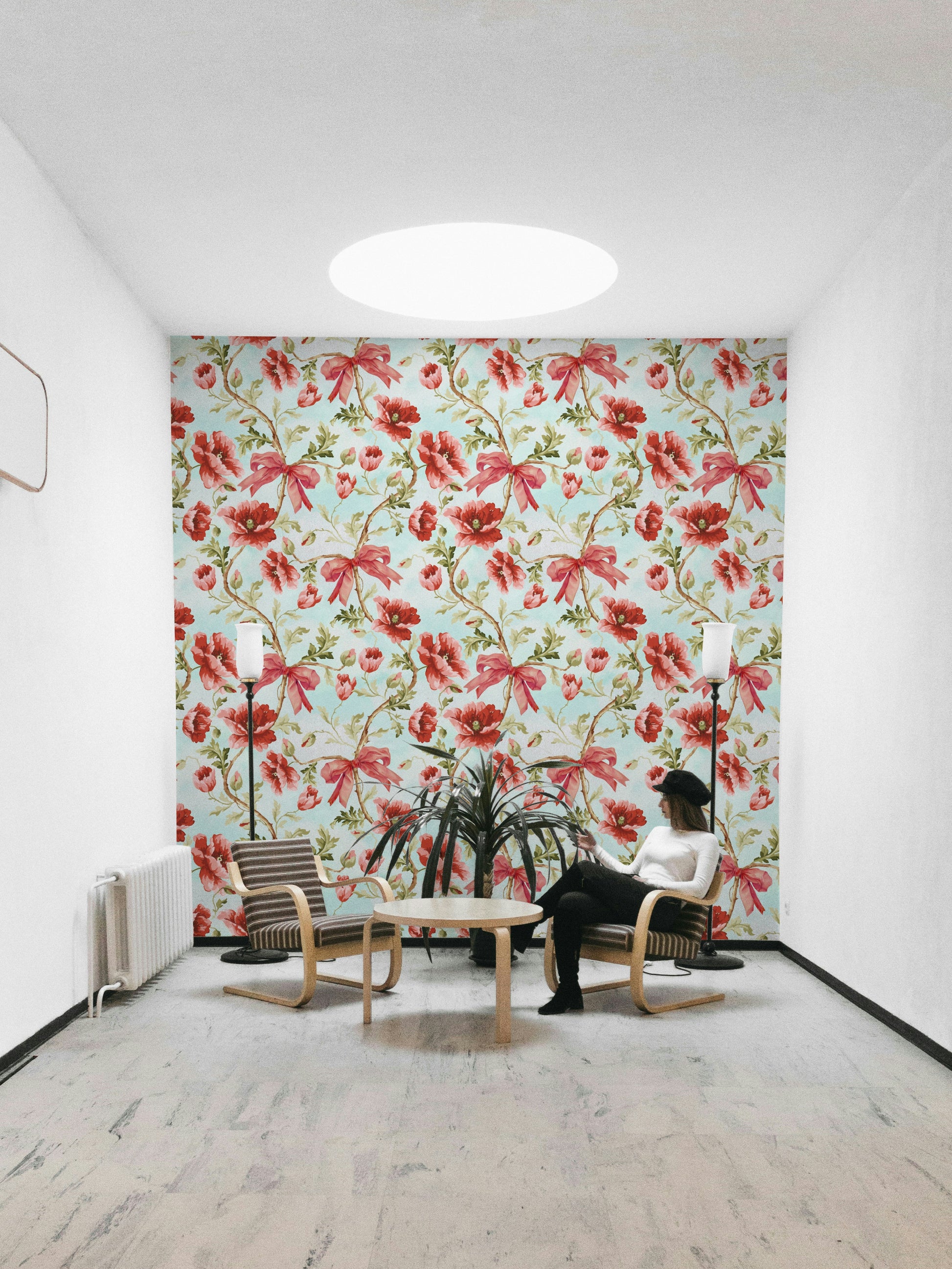 Energetic floral wallpaper with bold red petals and playful lines.

