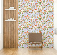 Romantic floral mural featuring perched birds and pastel florals.

