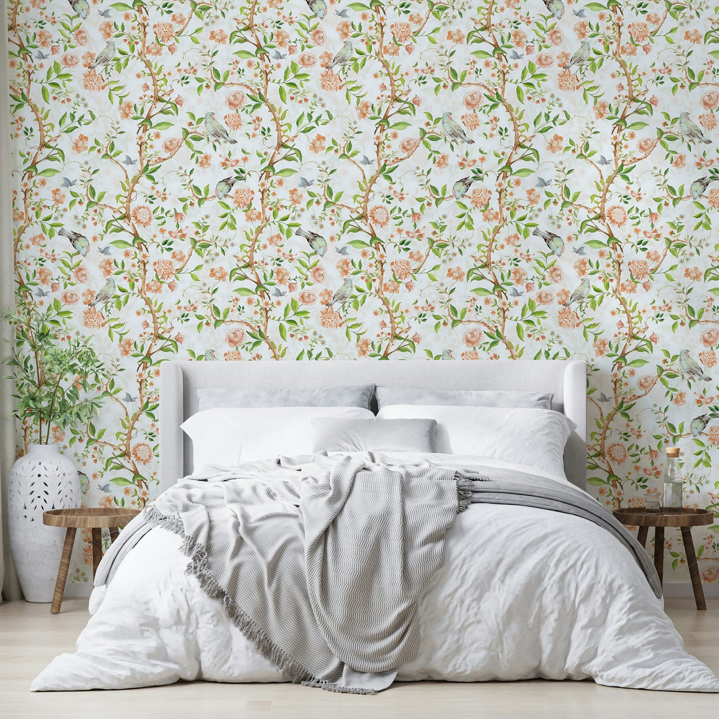 Gentle floral wallpaper with light tones and painted garden scenes.

