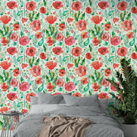 Close-up of spring poppies and greenery in a soft watercolor design.

