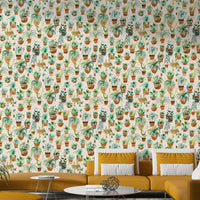 Calming mural with succulents and greenery in decorative pots.

