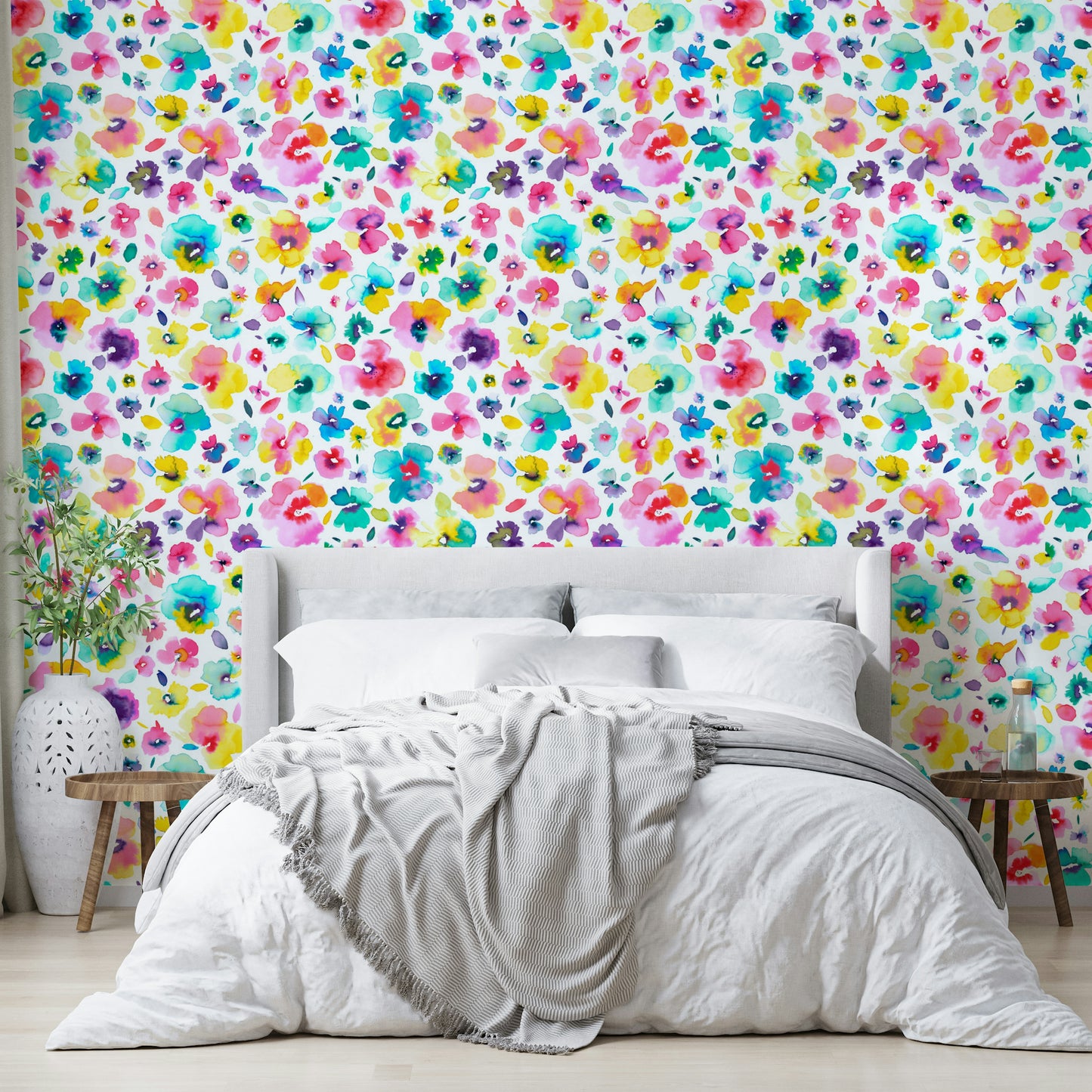 Bright tropical blooms on wallpaper with a fluid, painted look.

