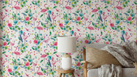 Tropical Flamingo Jungle Pink Green Wallpaper with lush leaves and birds.

