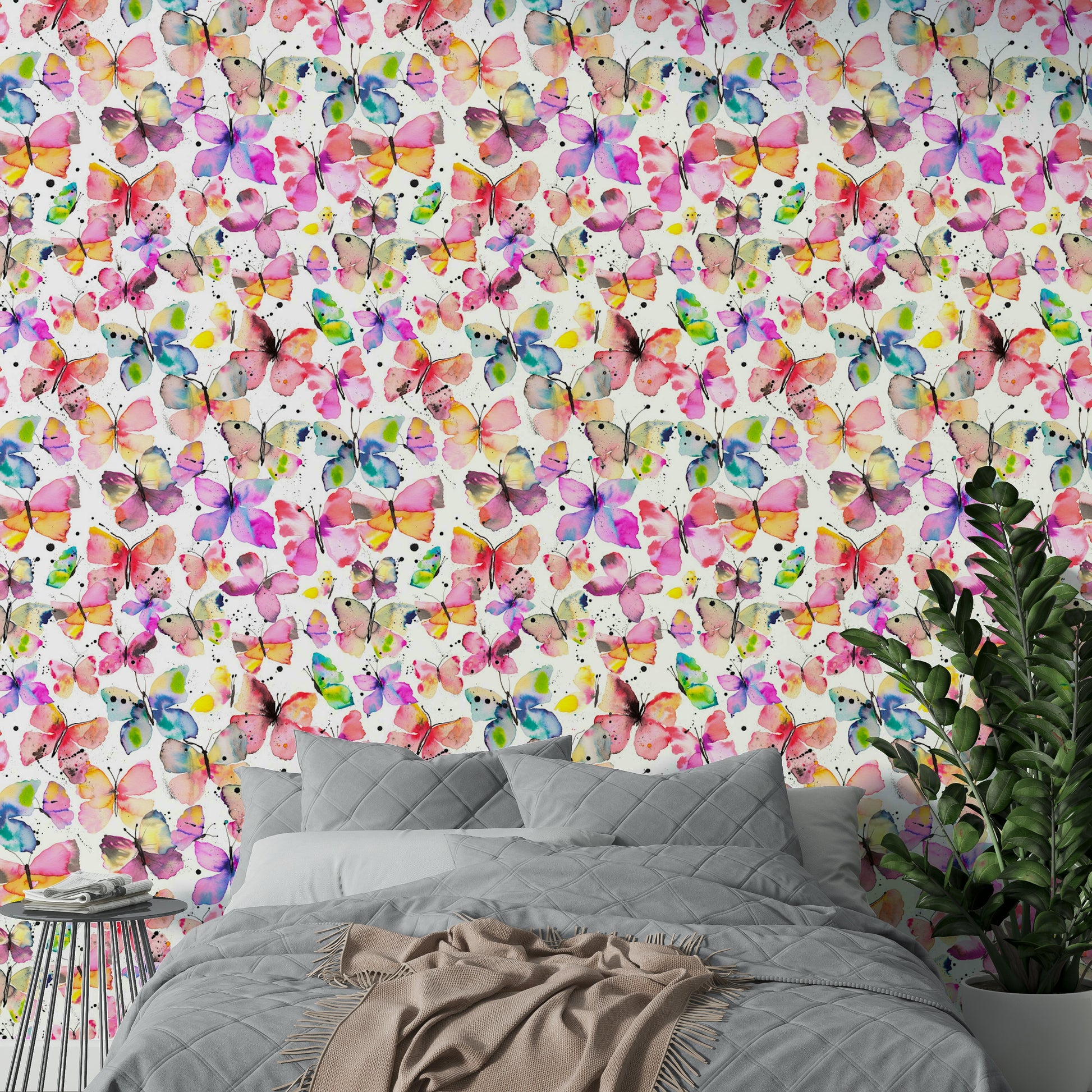 Delicate butterfly design in watercolor style on a light background.

