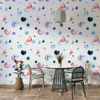 Gentle speckled dot wallpaper with soft blending in neutral tones.

