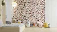 Natural wallpaper with delicate wildflowers in muted tones.

