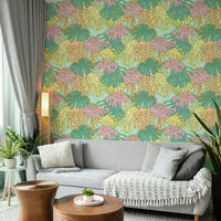Wallpaper design with pastel tropical foliage and aqua blue accents.

