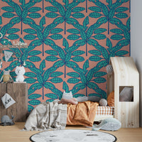 Retro-inspired wallpaper with tropical desert leaves in aqua blue and warm pink tones.

