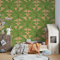Mid-century modern wallpaper with bold desert leaves in green and orange.

