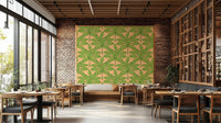 Green and orange tropical leaf wallpaper with a mid-century flair.

