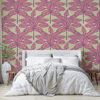 Mid-century modern wallpaper with tropical palm fronds in pink and purple tones.

