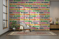 Wallpaper featuring rainbow-colored anchovies on a soft cream background.

