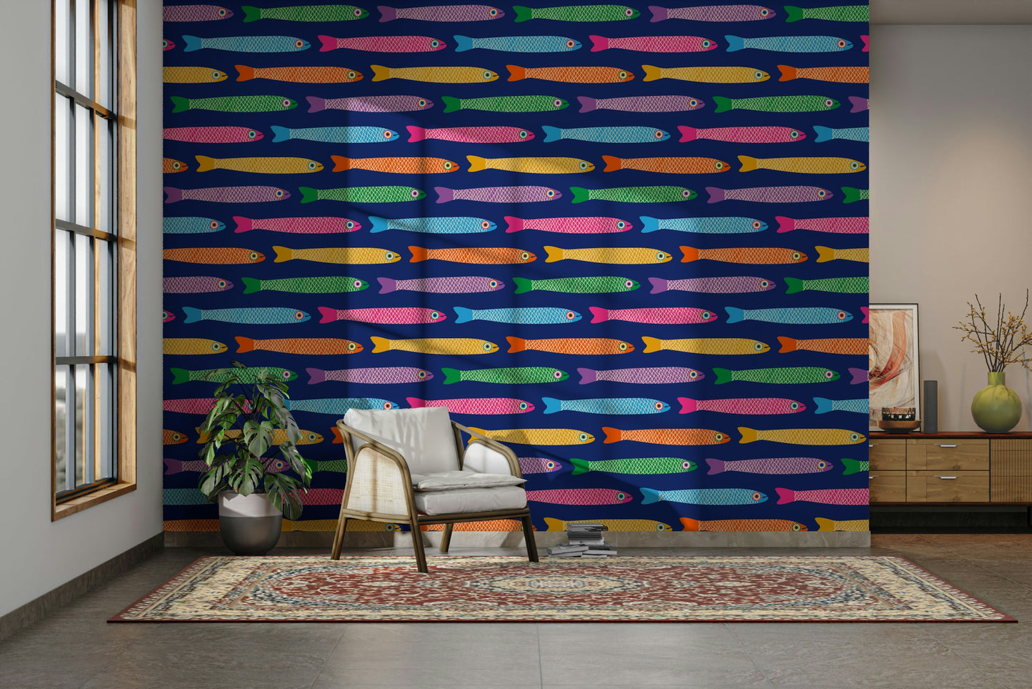 Playful anchovies fish wallpaper in rainbow shades on a deep blue backdrop.

