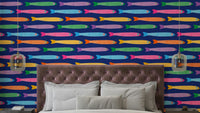 Anchovies Bright Rainbow Fish on Royal Blue Wallpaper with vibrant fish.

