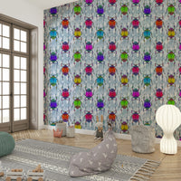 Soft blue wallpaper with cheerful bug design

