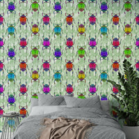 Rainbow-toned insects on leafy green wallpaper

