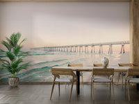 Sunset over the ocean mural with tranquil pier

