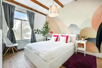 Soft sky-inspired wall mural with calming hues

