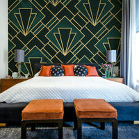 Luxurious emerald Art Deco mural with intricate geometric patterns.

