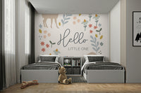 Serene and whimsical "Hello Little One" nursery mural.

