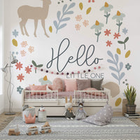 "Hello Little One" wall mural with gentle forest designs.

