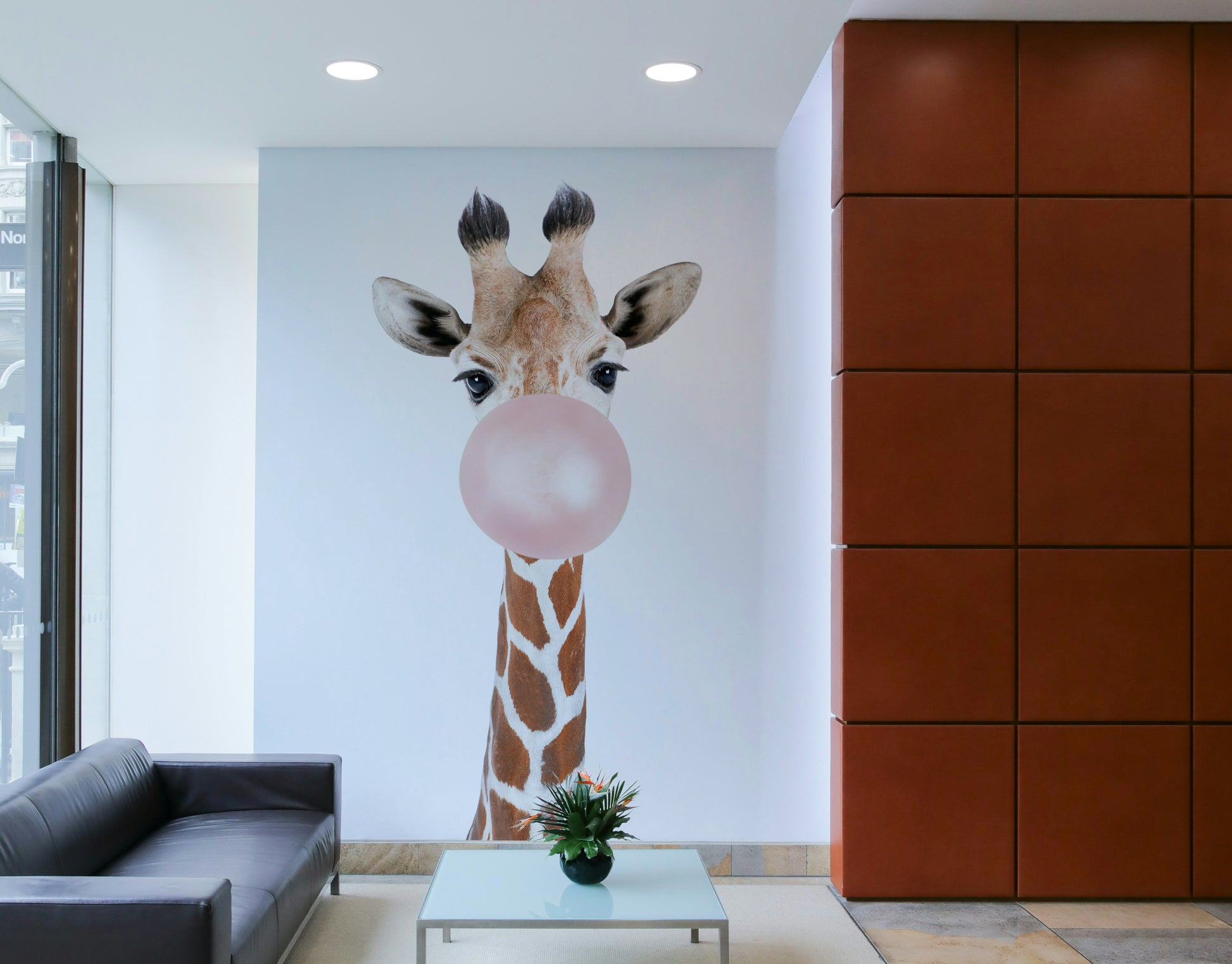 Cute giraffe with bubble gum in vibrant mural design for decor.

