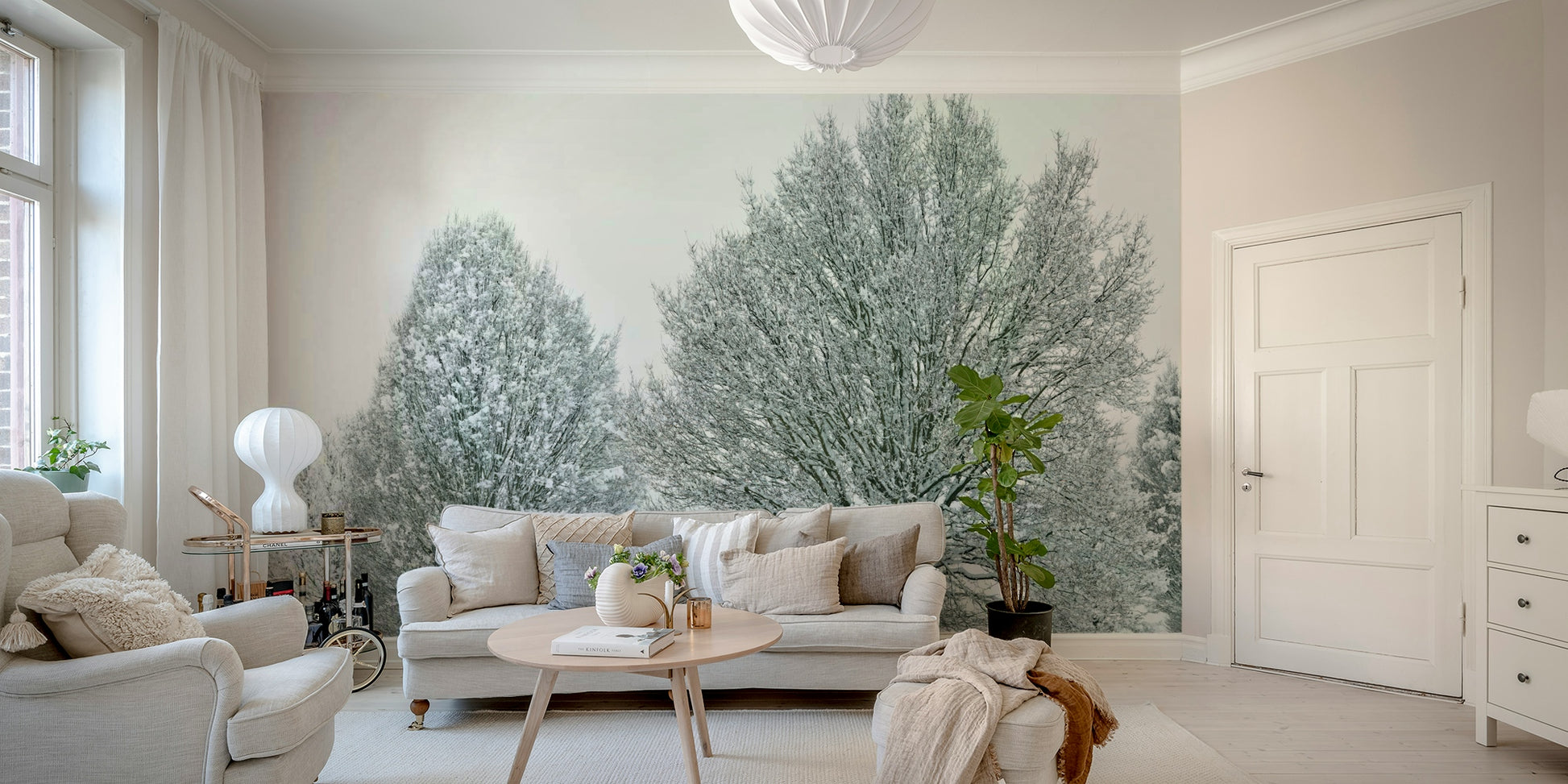 Serene frosty trees mural wallpaper creating a tranquil room vibe.

