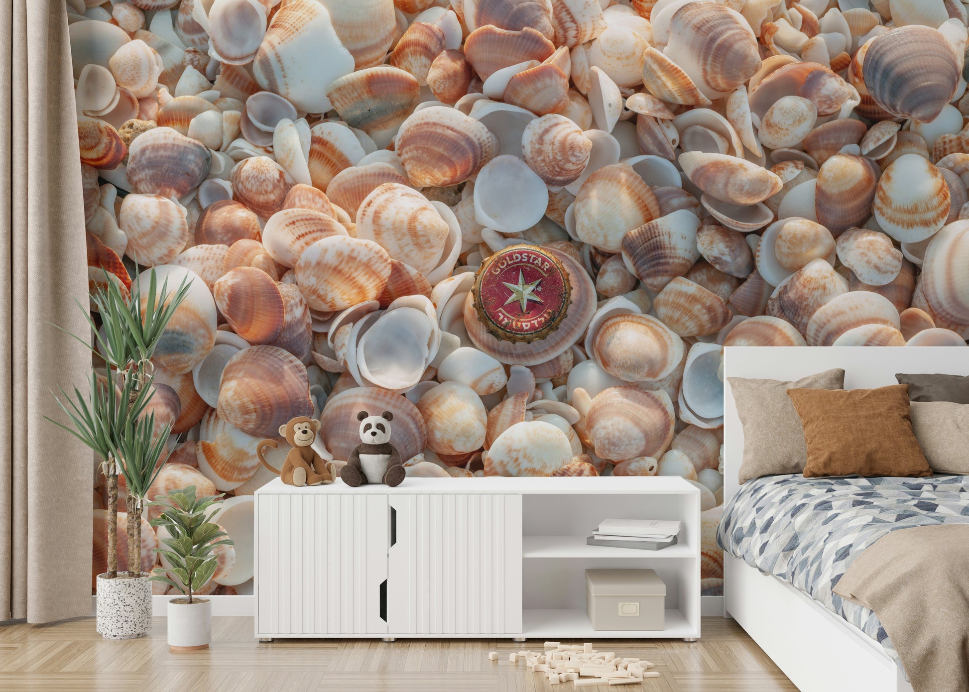 Beach Treasures wall mural with smooth stones and shells on the sand.

