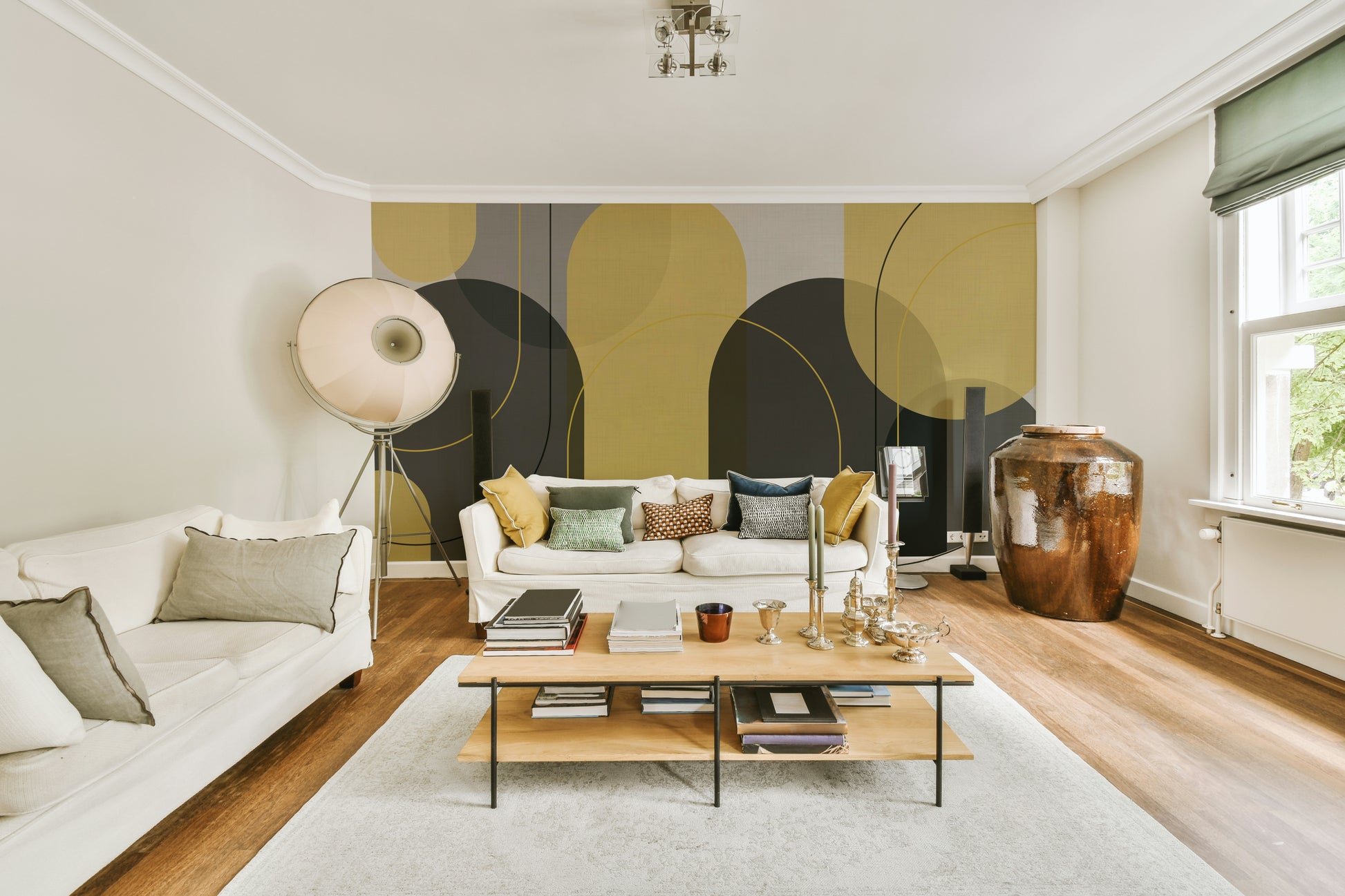 Soft geometric wall mural with grey and yellow arches

