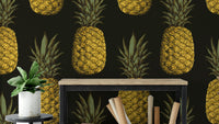 Golden pineapples wallpaper with tropical pattern

