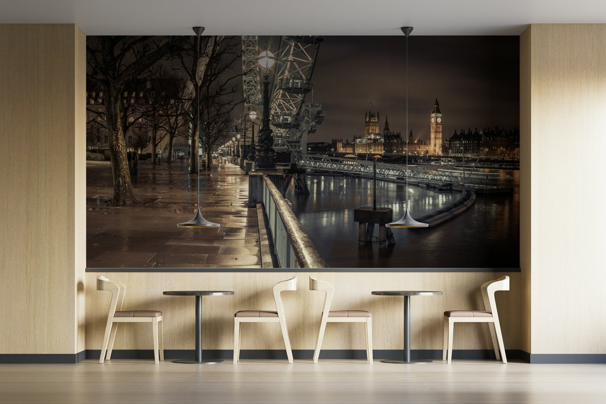 Thames River at night with London skyline captured in a wall mural.

