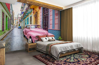 Colorful Cuba mural with old-school pink car

