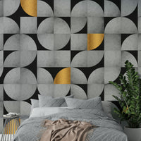 Concrete and gold wall mural with a mid-century aesthetic

