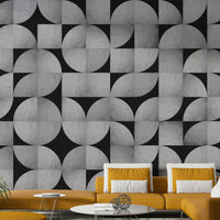 Vintage-inspired concrete mosaic mural with bold patterns


