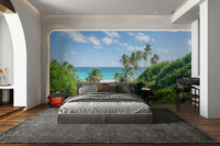 Scenic tropical beach wall design with palm shadows.

