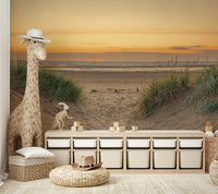 Sandy path mural leading to the ocean under a sunset glow.

