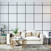 Scandinavian-style wallpaper with black grid lines on white.

