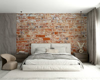 Rustic brick wall mural in warm, faded tones

