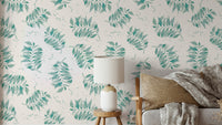Aqua wallpaper with hand-painted palm leaf design

