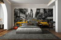 Yellow taxis adding a pop of color to the black-and-white background

