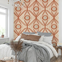 Terracotta floral mural wallpaper on light base
