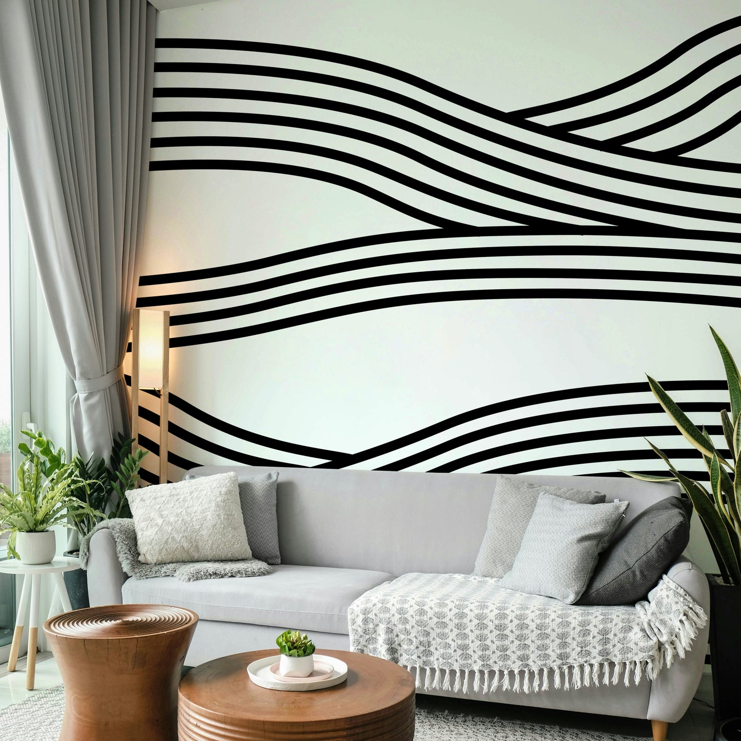 Artistic black-and-white wave design with fluid motion.

