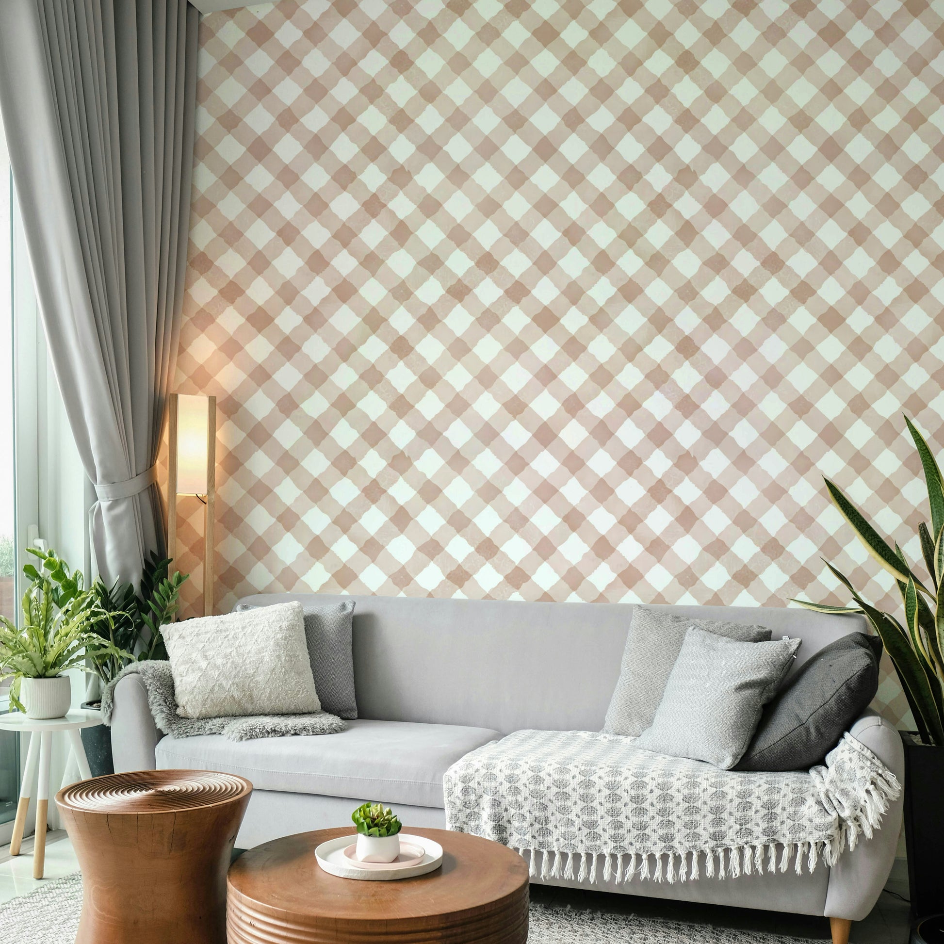 Cozy hand-painted pink gingham wallpaper creating a welcoming atmosphere

