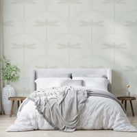 Intricate dragonfly design in bold metallic tones for wallpaper


