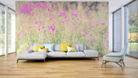 Calming countryside meadow mural with soft floral tones

