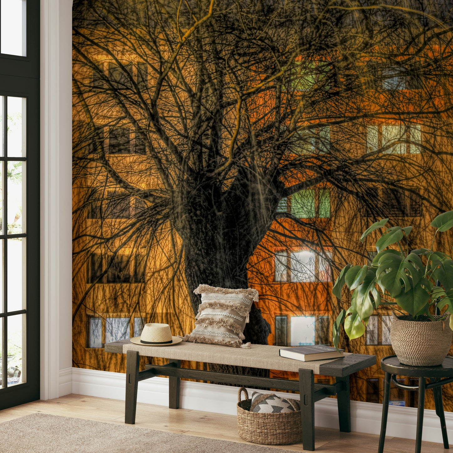 Urban Nightscape Tree Silhouette Against Illuminated Building Wall Mural.

