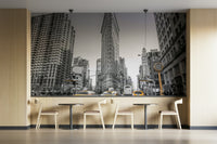 Blurred yellow taxis speeding along the street.

